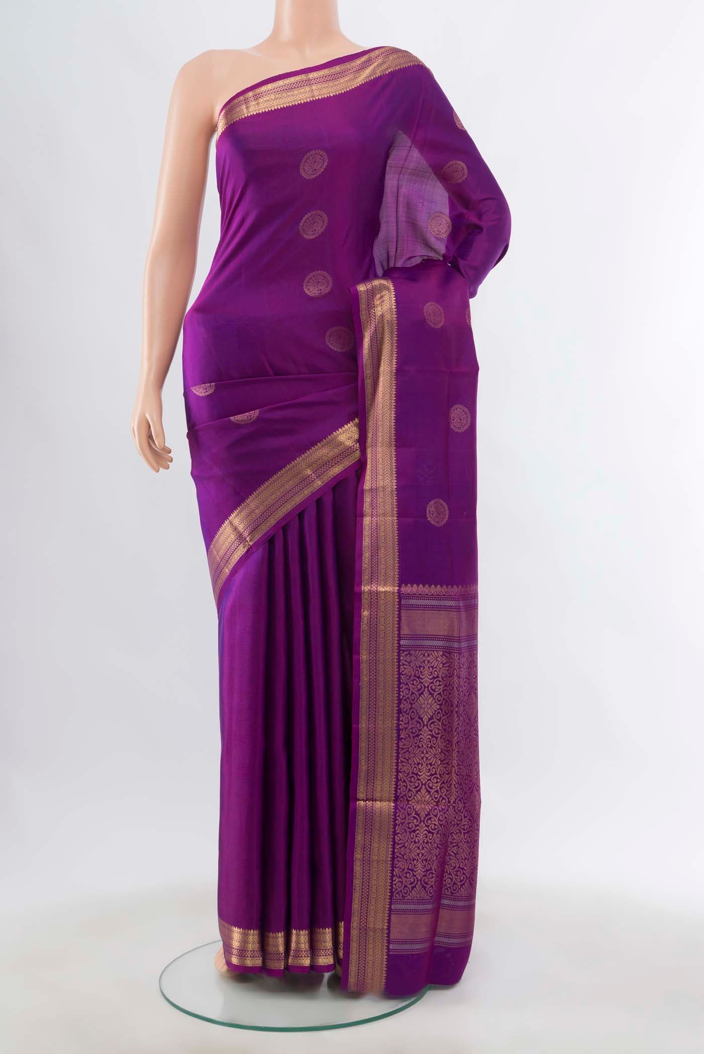 Purple Soft Silk Saree with Zari Butta on the body and Silk Border displayed on a mannequin