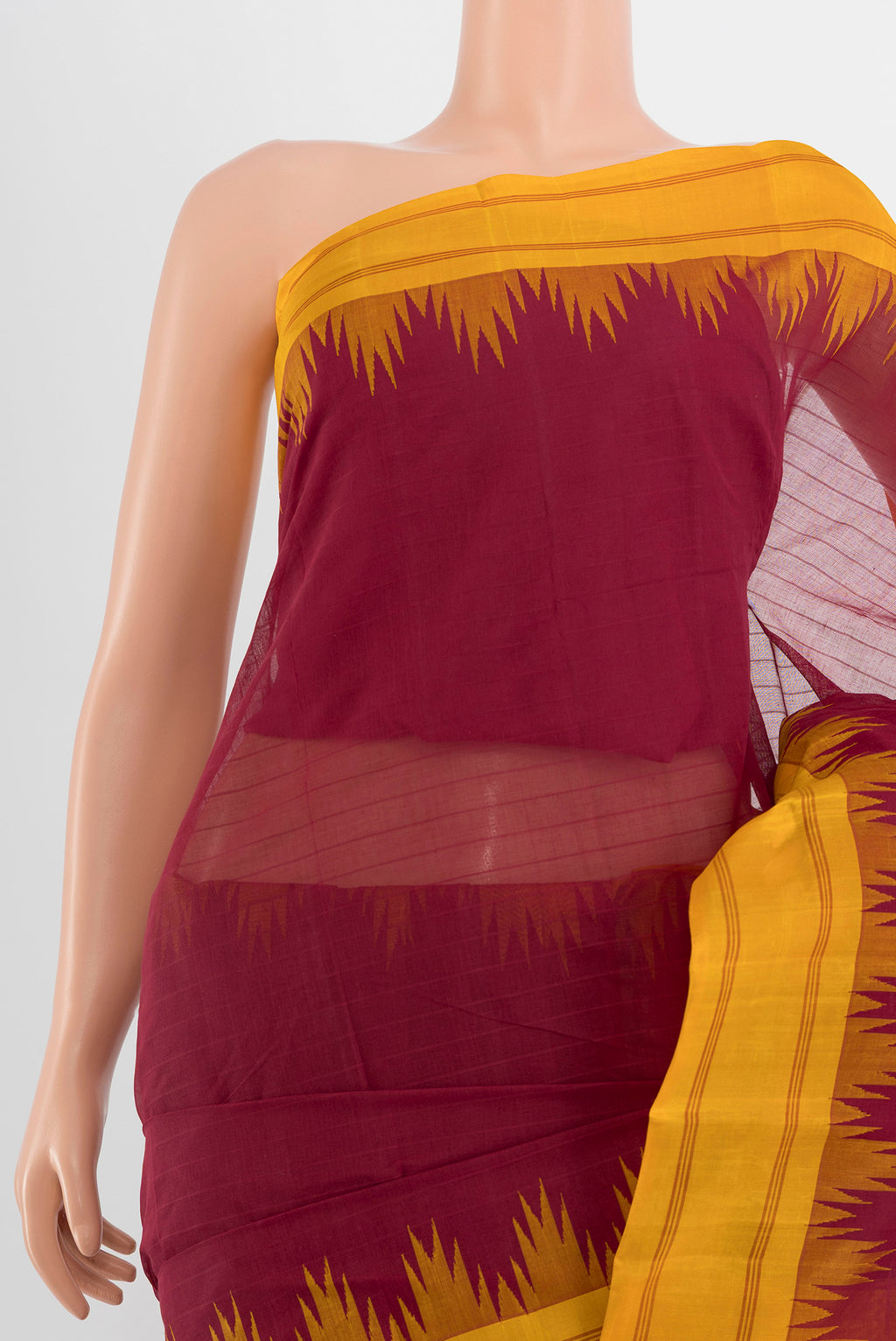 Border image of Maroon Kanchi Cotton Saree with Plain Body and Silk Border. 