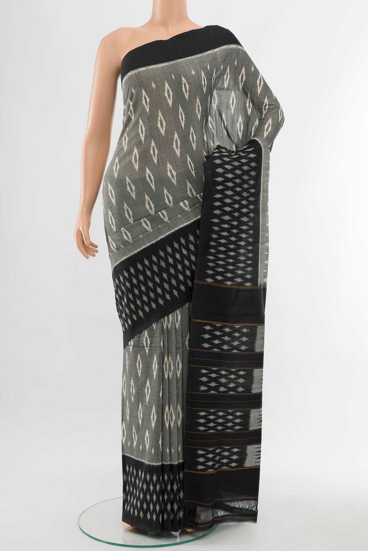 Grey Pochampally Cotton Saree with Pure Ikat on the body and Plain Border displayed on a mannequin