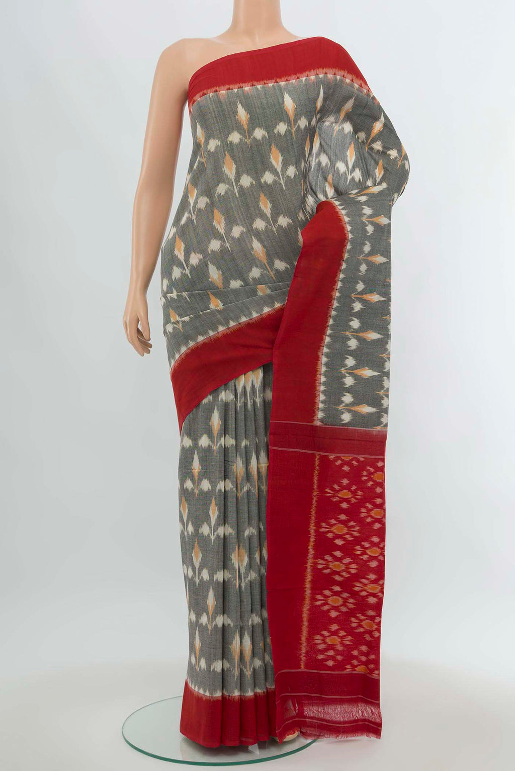 Multi Color Pochampally Cotton Saree with Checked design on the body and Checks Border.  displayed on a mannequin