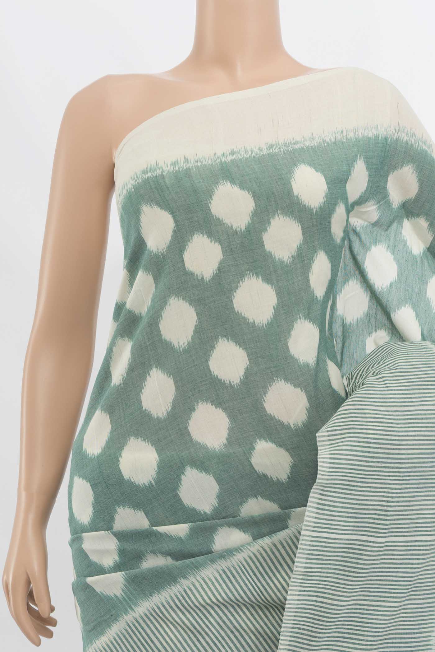 Border image of Cream Pochampally Cotton Saree with Ikat Print on the body and Ikat Border. 