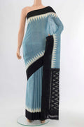 Light Blue Pochampally Cotton Saree with Ikat Print on the body and Ikat Border displayed on a mannequin