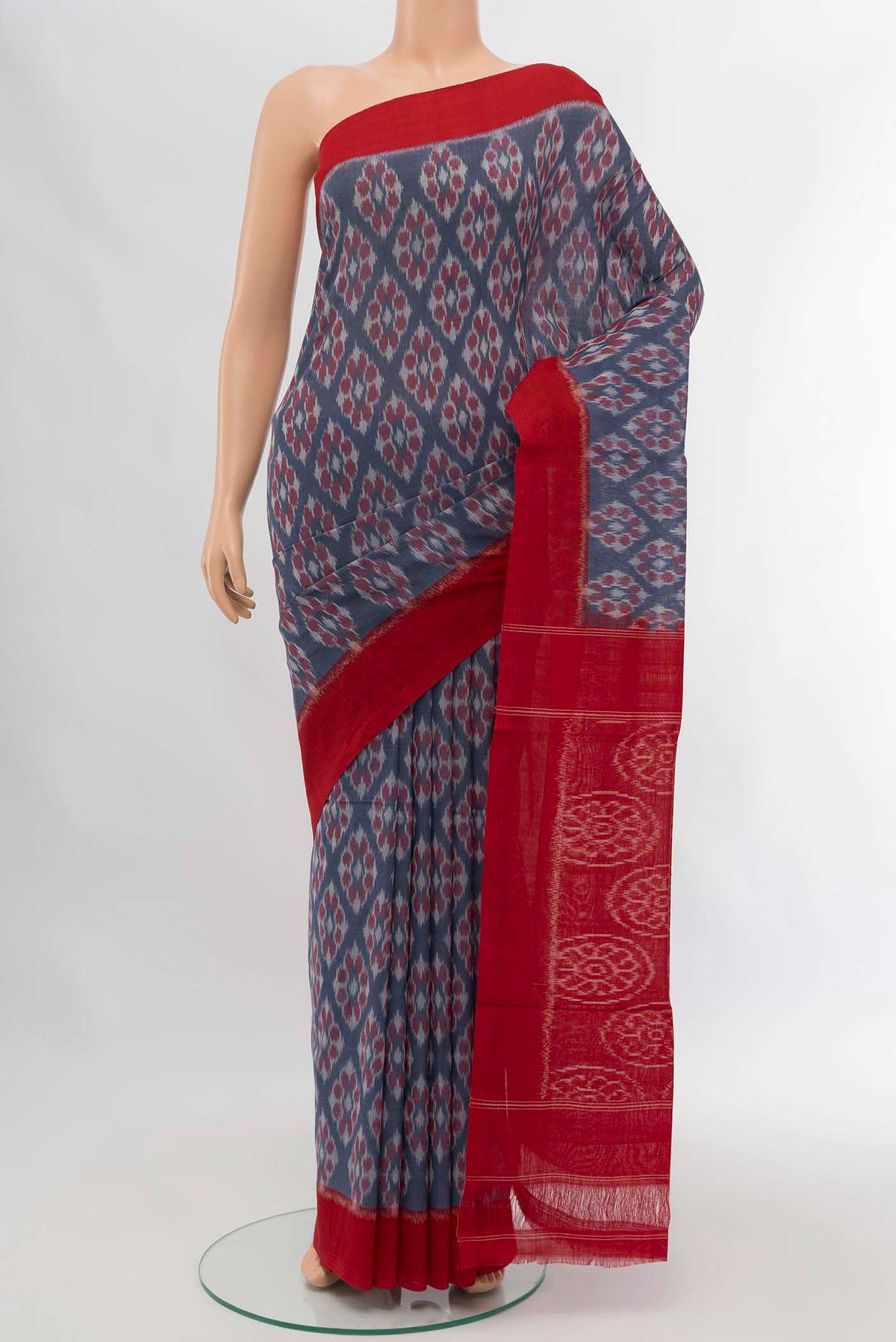 Blue Cotton Saree with Pure Ikat on the body and Plain Border displayed on a mannequin