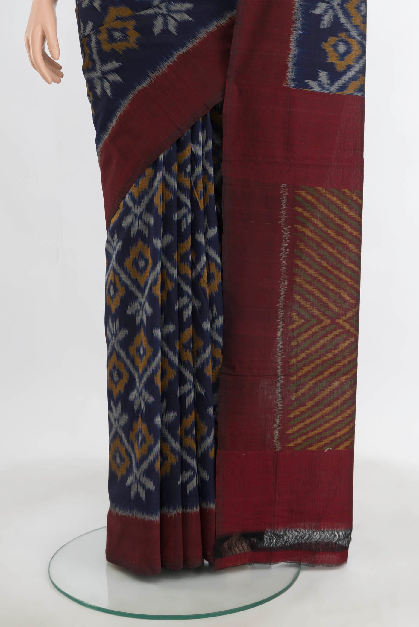 Pleats and pallu of Navy Blue Pochampally Cotton Saree with Ikat Print on the body and Ikat Border. 