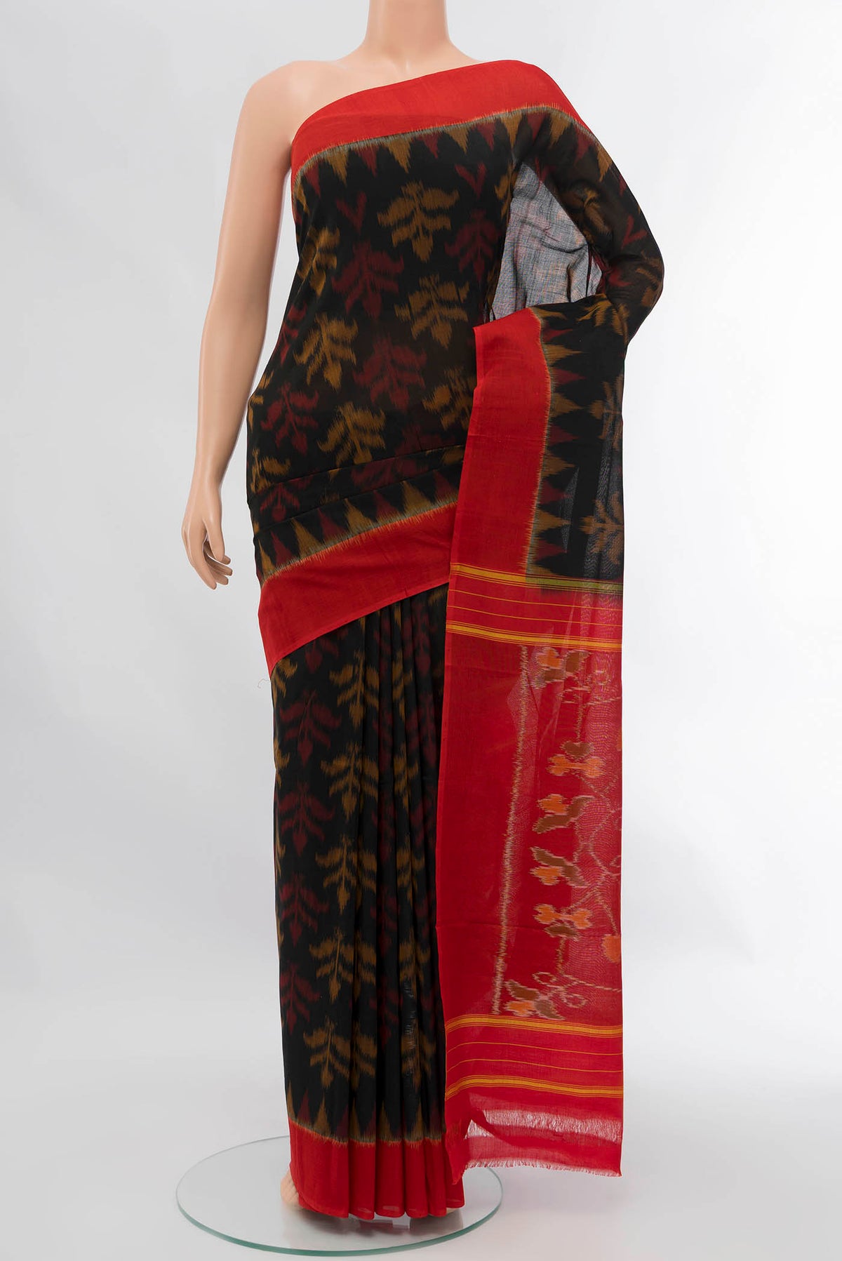Black Pochampally Cotton Saree with Ikat design on the body and Attached Border displayed on a mannequin