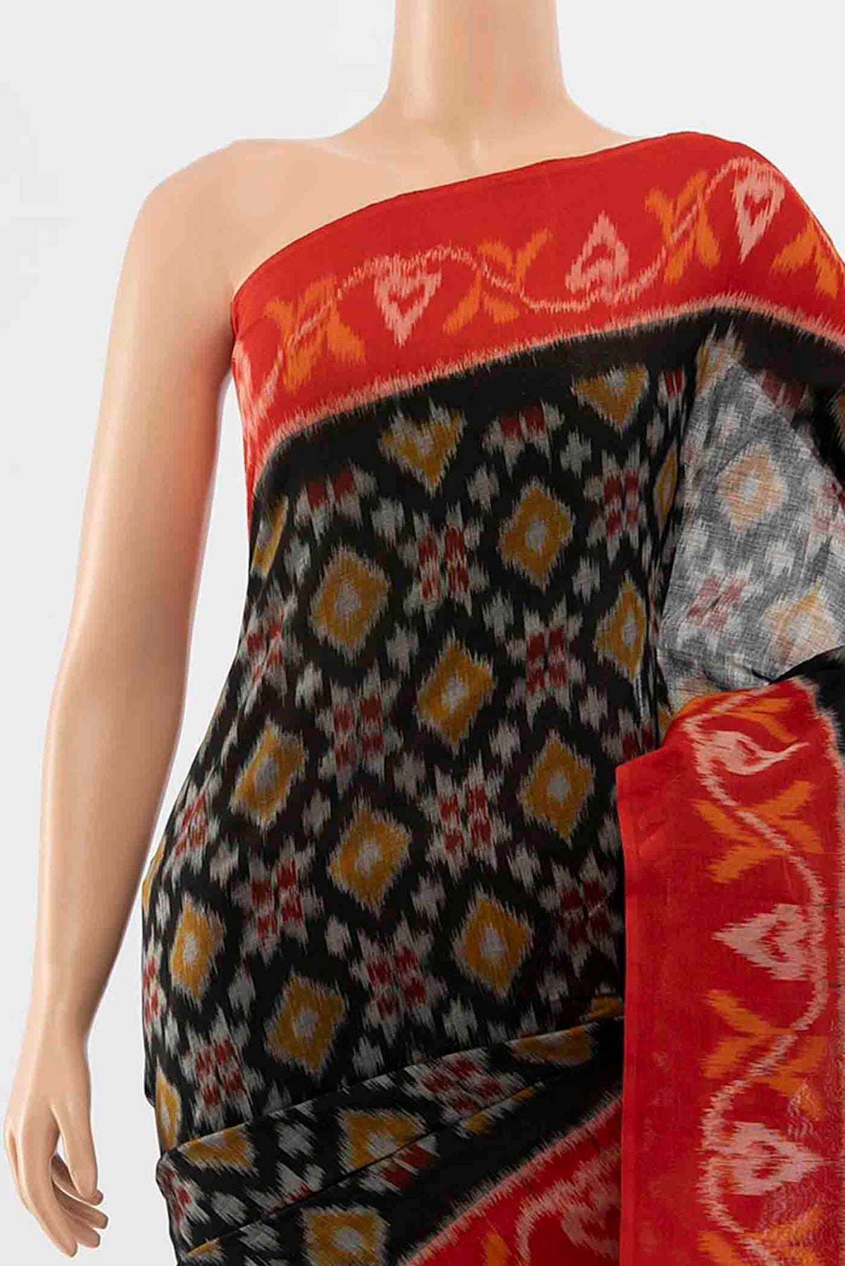 Border image of Black Pochampally Cotton Saree with Ikat Print on the body and Ikat Border