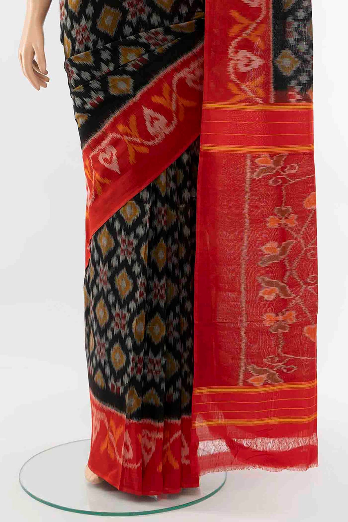 Pleats and pallu of Black Pochampally Cotton Saree with Ikat Print on the body and Ikat Border