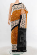 Multi Color Pochampally Cotton Saree with Ikat Print on the body and Silk Border.  displayed on a mannequin