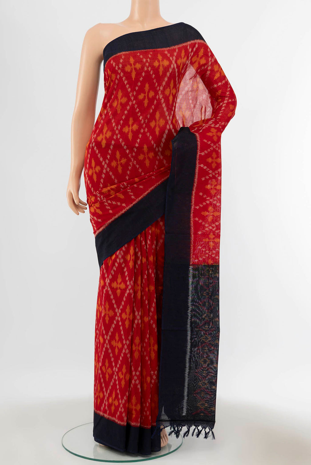 Red Pochampally Cotton Saree with Pure Ikat on the body and Plain Border displayed on a mannequin