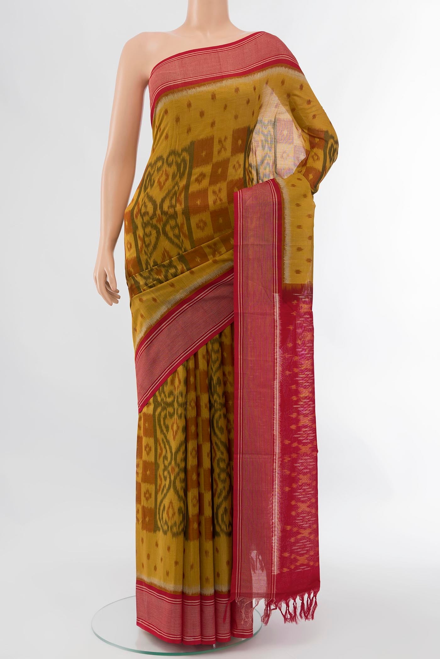Mustard Pochampally Cotton Saree with Floral Print on the body and Ikat Border displayed on a mannequin