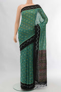 Blue Pochampally Cotton Saree with Pure Ikat on the body and Plain Border displayed on a mannequin