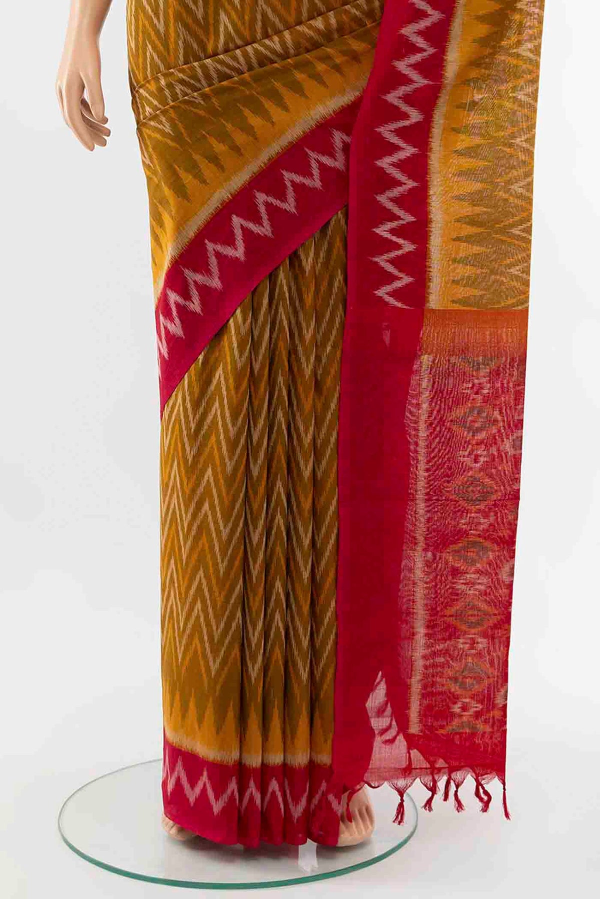 Pleats and pallu of Mustard Pochampally Cotton Saree with Ikat Print on the body and Ikat Border