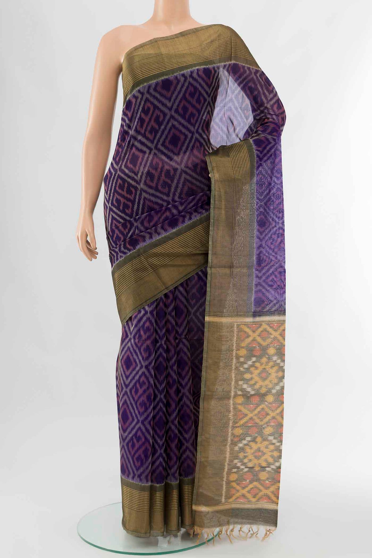 Navy Blue Kora Cotton Saree with Ikat Print on the body and Fancy Border displayed on a mannequin
