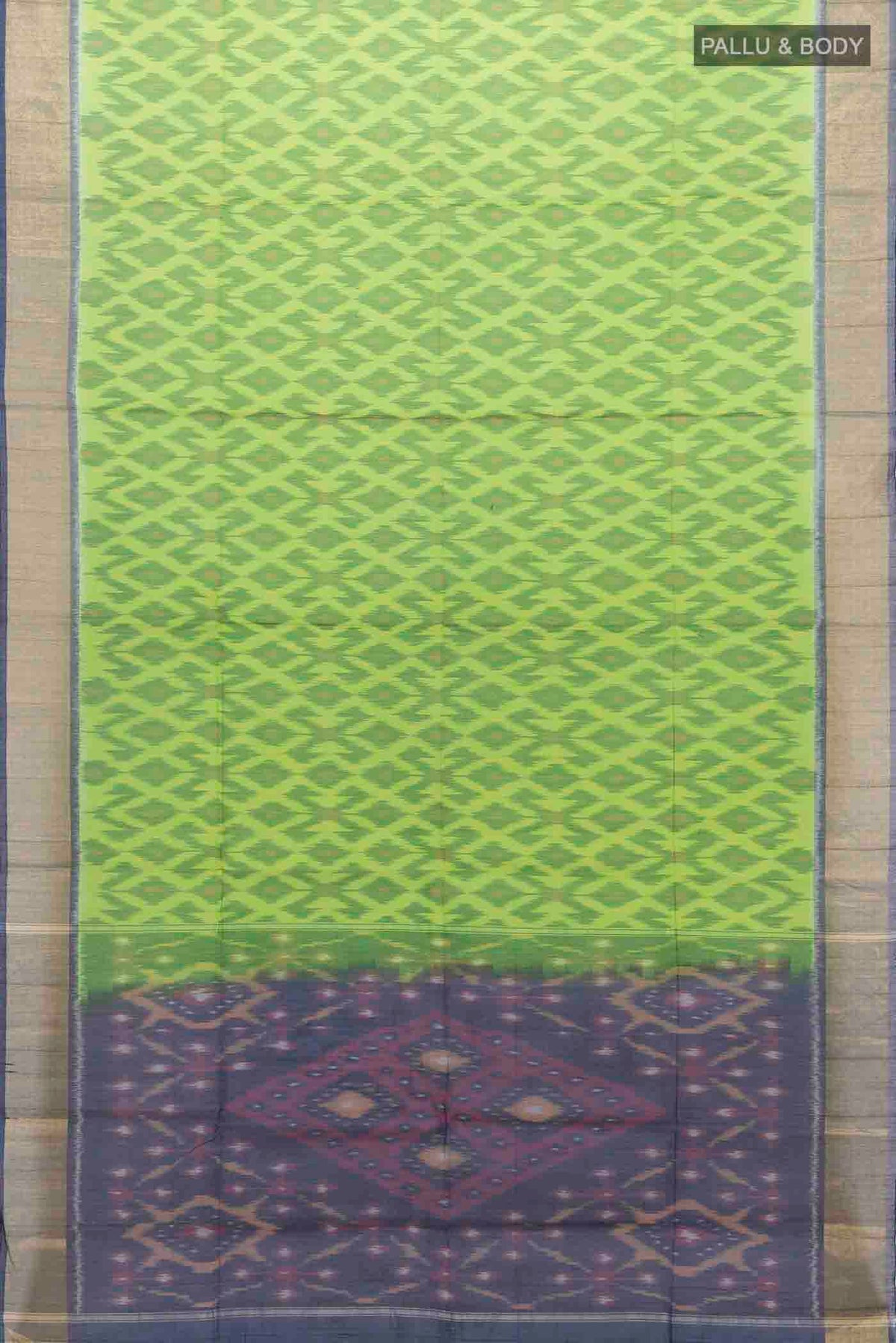 Flat view of Parrot Green Kora Cotton Saree with Ikat Print on the body and Ikat Border