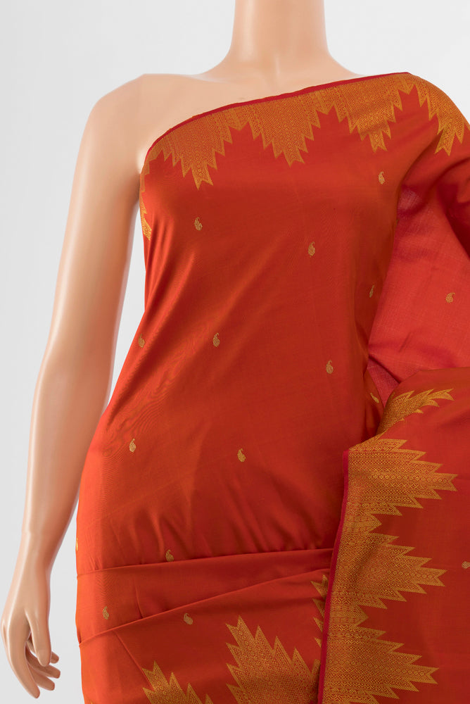 Border image of Rust Kanchipuram Silk Saree with Zari Butta on the body and Silk Border. 