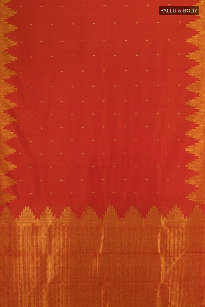 Flat view of Rust Kanchipuram Silk Saree with Zari Butta on the body and Silk Border. 