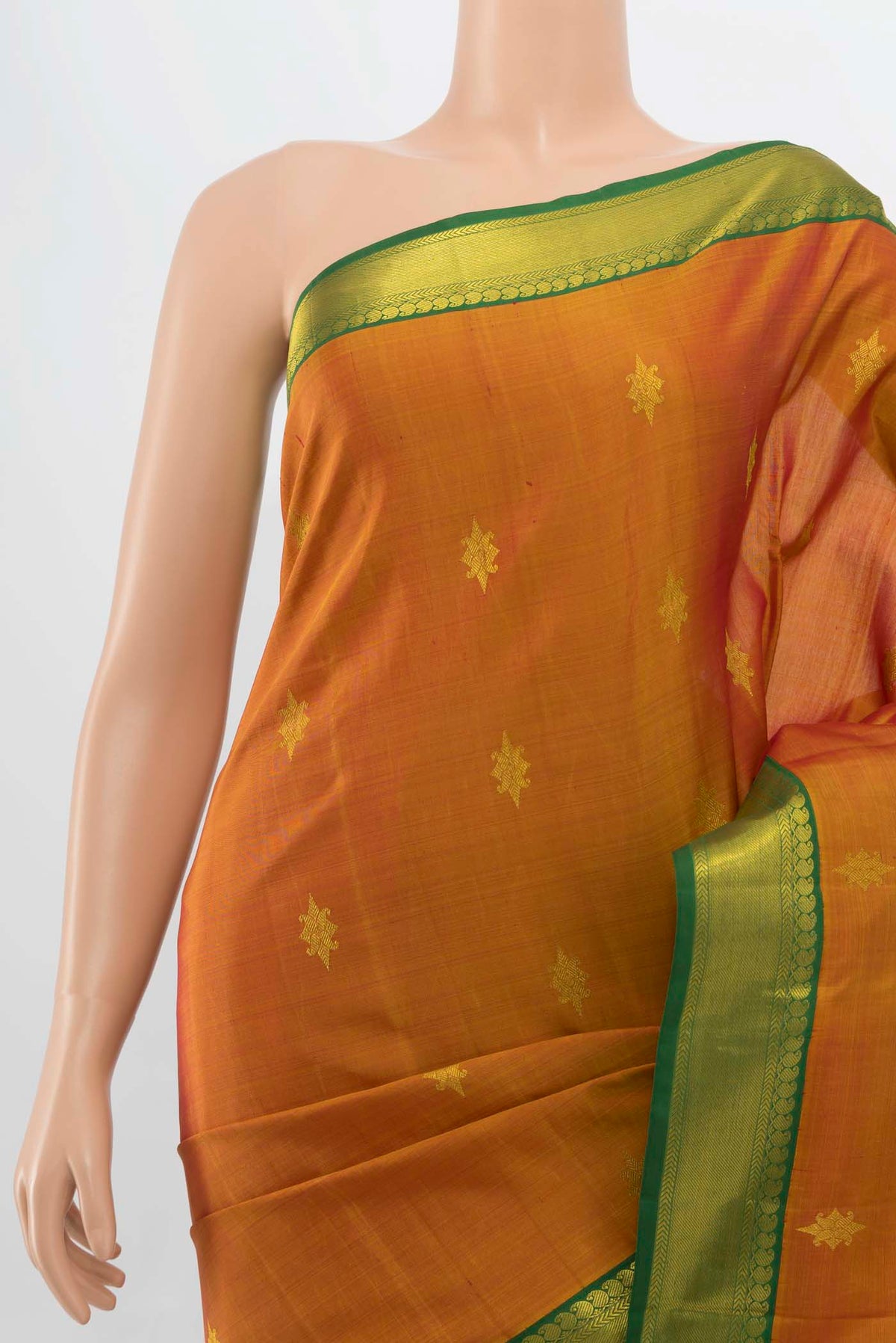 Border image of Pure Silk Pure Zari Rust Kanjivaram Saree with Zari Butta on the body and Silk Border. 
