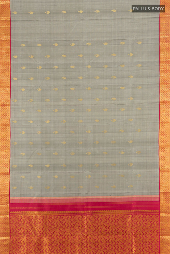 Flat view of Davys Grey Kanjivaram Silk Saree with Zari Butta on the body and Silk Border. 