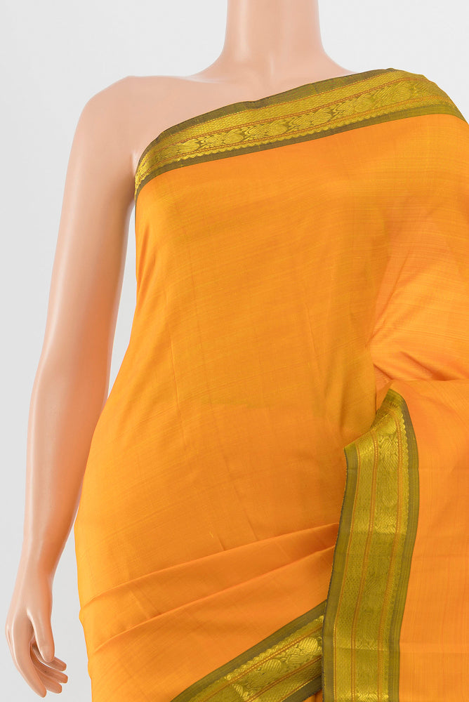 Border image of Yellow Kanchipuram Silk Saree with Zari Butta on the body and Silk Border. 