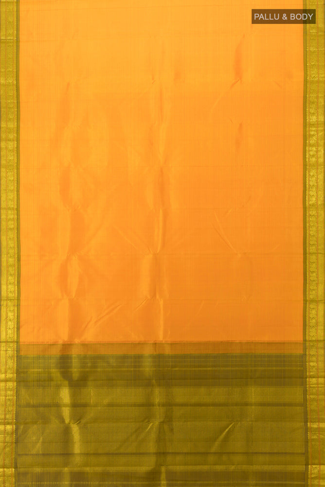 Flat view of Yellow Kanchipuram Silk Saree with Zari Butta on the body and Silk Border. 