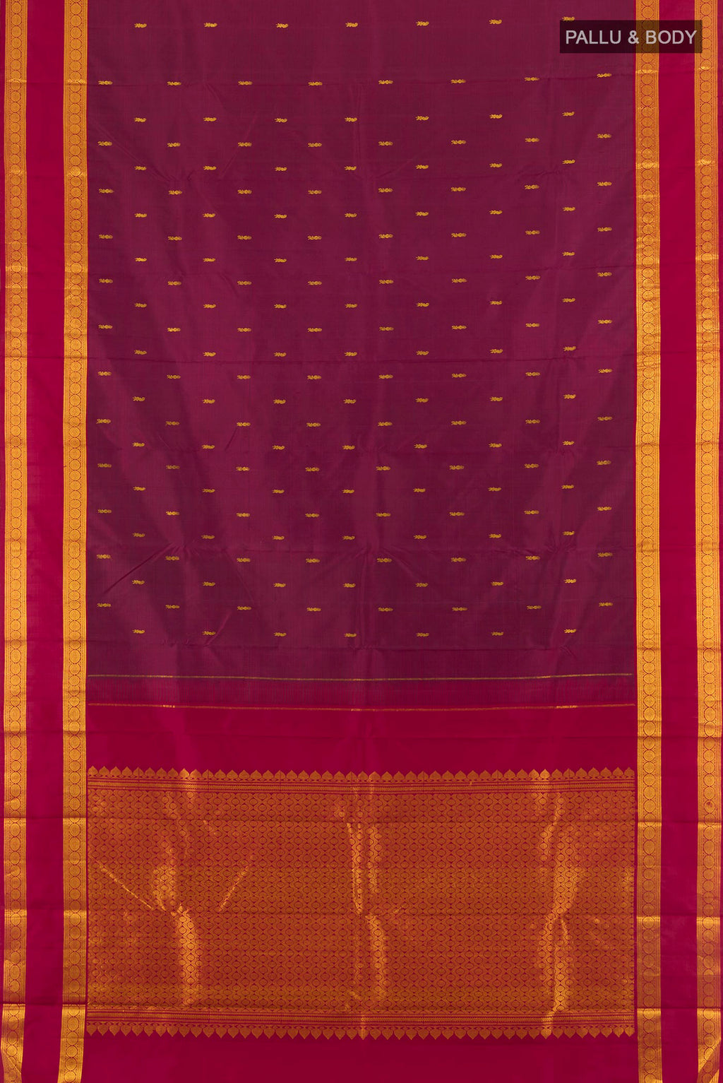 Flat view of Maroon Kanchipuram Silk Saree with Zari Butta on the body and Zari Border. 