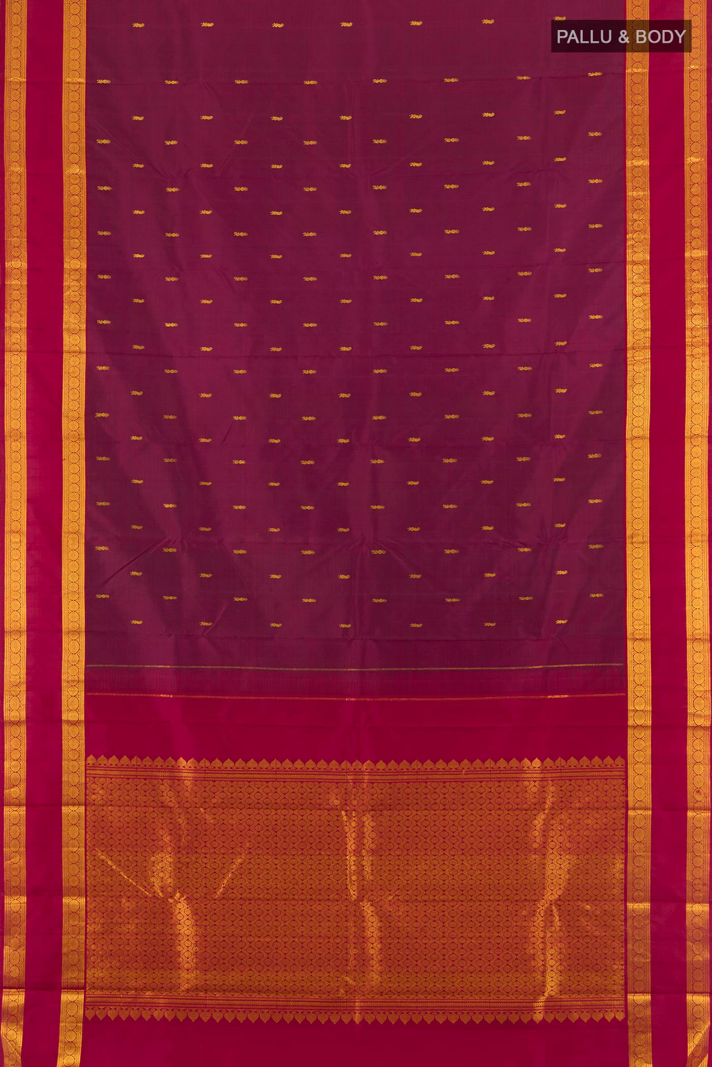 Flat view of Maroon Kanchipuram Silk Saree with Zari Butta on the body and Zari Border. 