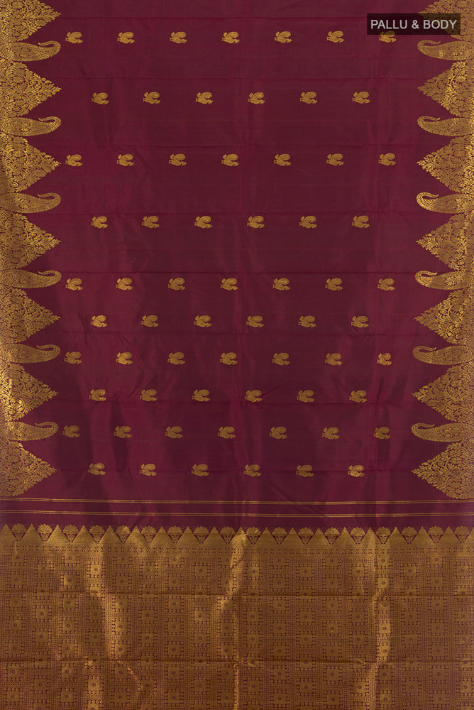 Flat view of Pure Silk Pure Zari Coffee Brown Kanjivaram Saree with Zari Butta on the body and Silk Border. 