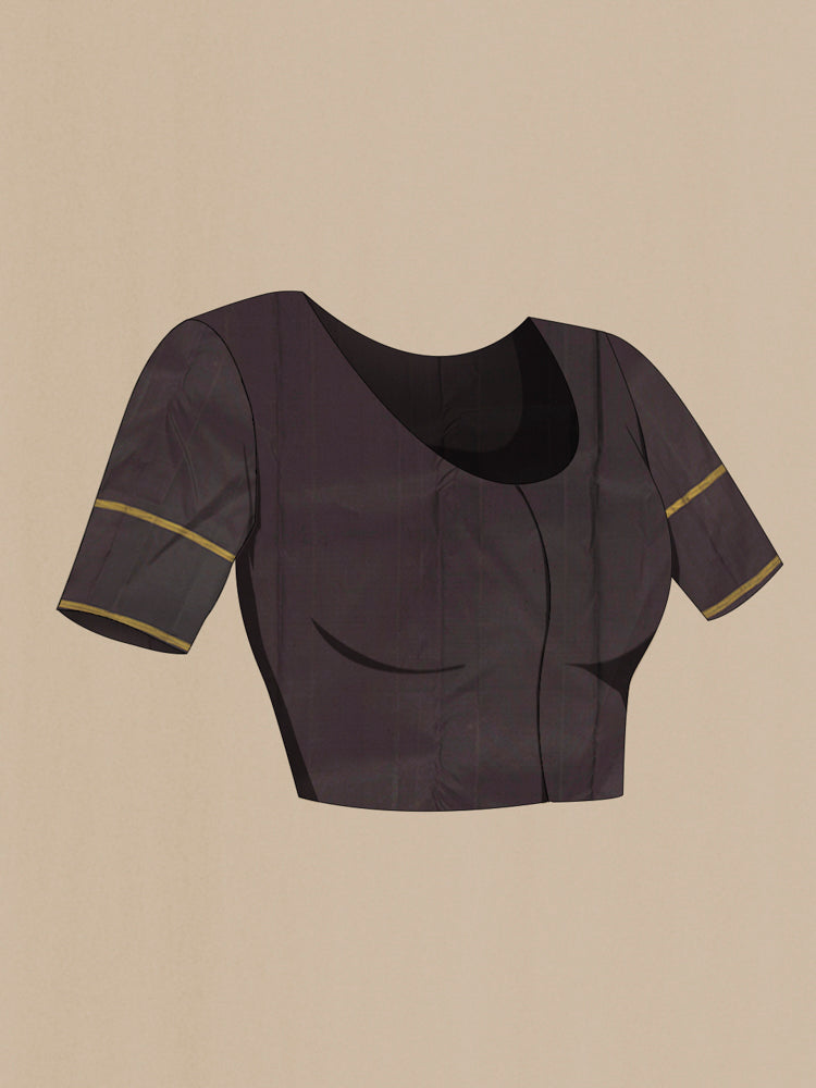 Close up image of the blouse of Orange Kanchipuram Silk Saree with Zari Butta on the body and Silk Border. 