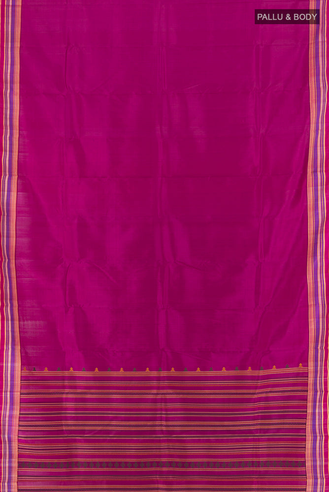 Flat view of Purple Kanchipuram Silk Saree with Zari Butta on the body and Silk Border. 