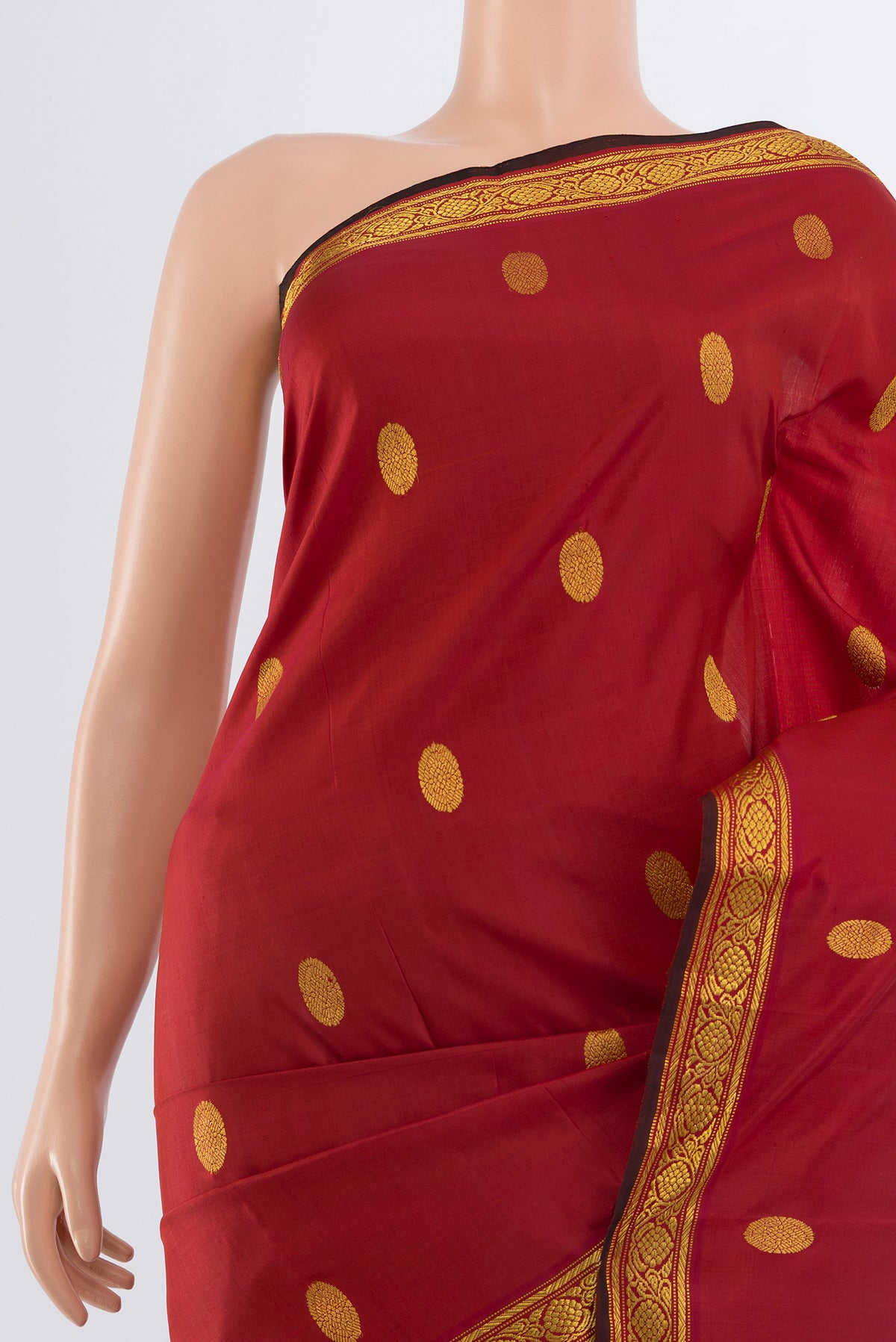 Border image of Maroon Kanjivaram Silk Saree with Zari Butta on the body and Silk Border. 