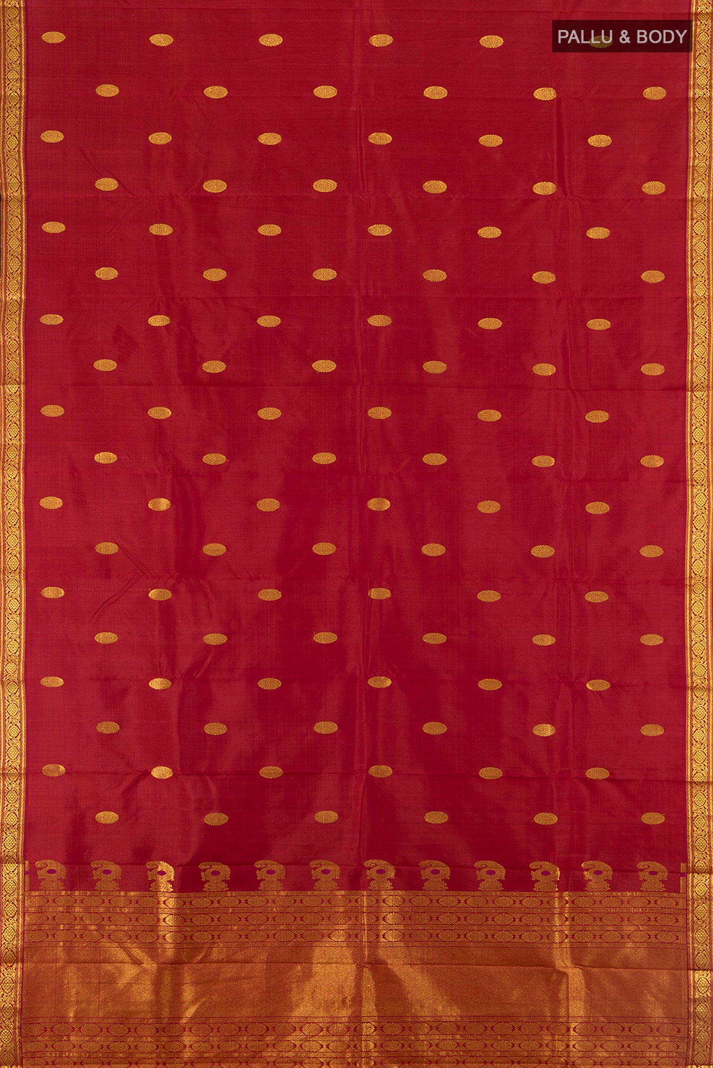 Flat view of Maroon Kanjivaram Silk Saree with Zari Butta on the body and Silk Border. 