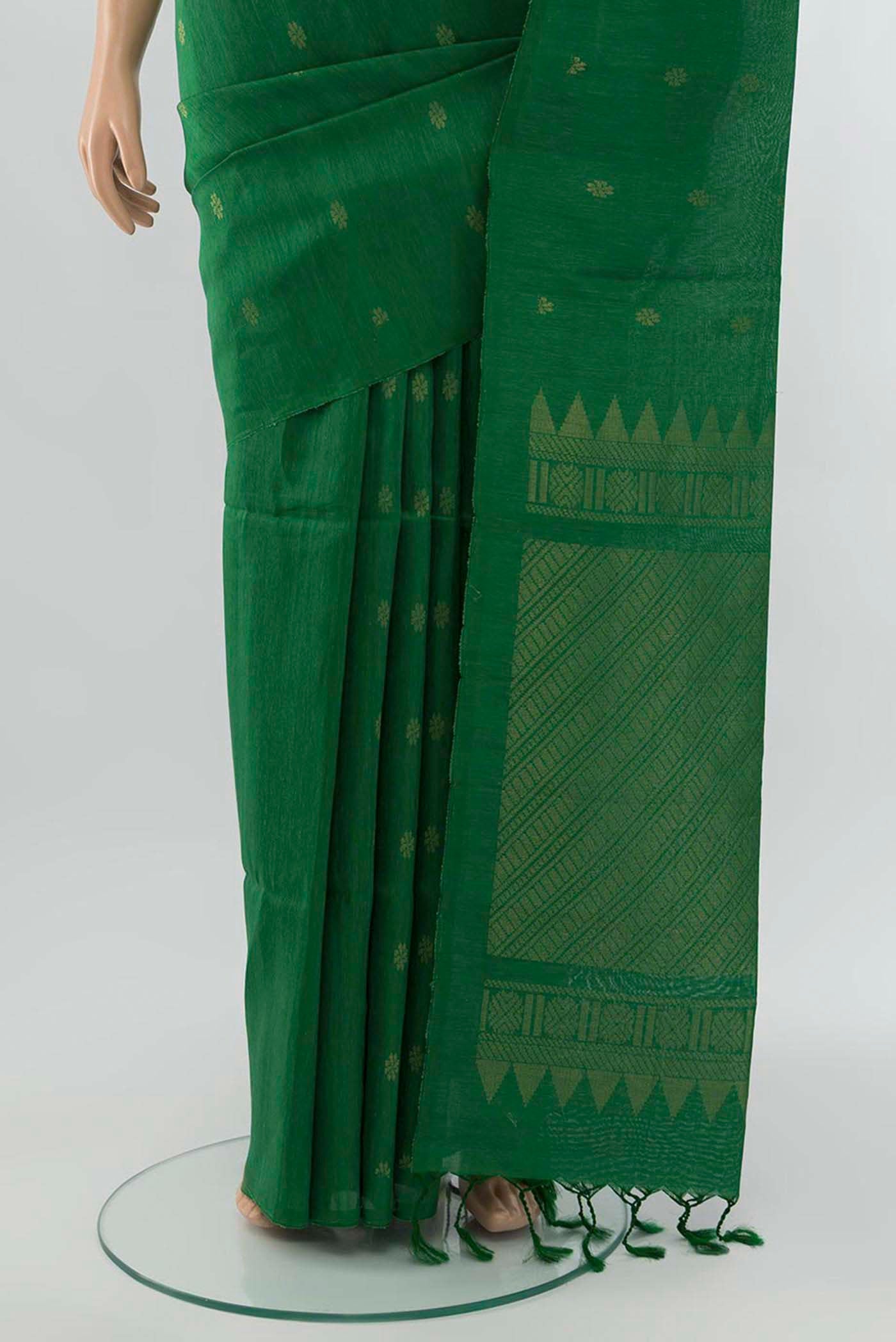 Pleats and pallu of Light Green Soft Silk Saree with Zari Brocade on the body and Silk Border