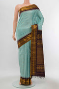 Sky Blue Gadwal Silk Saree with Zari Butta on the body and Zari Border displayed on a mannequin