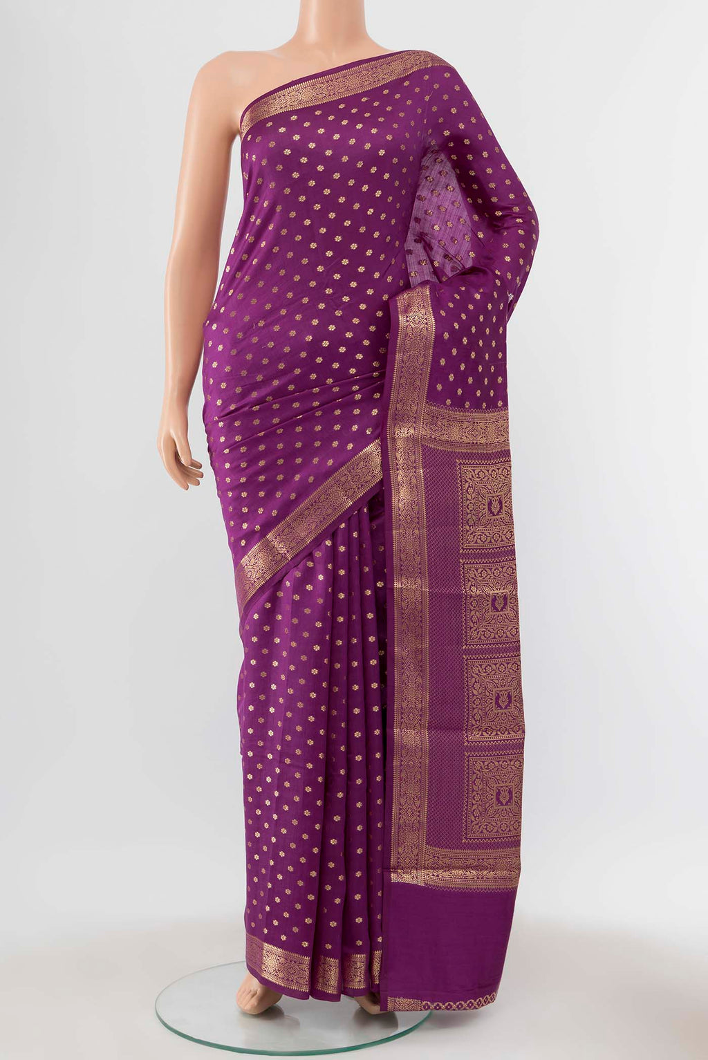 Magenta Banarasi Raw Silk Saree with Zari Butta on the body and Silk Border displayed on a mannequin