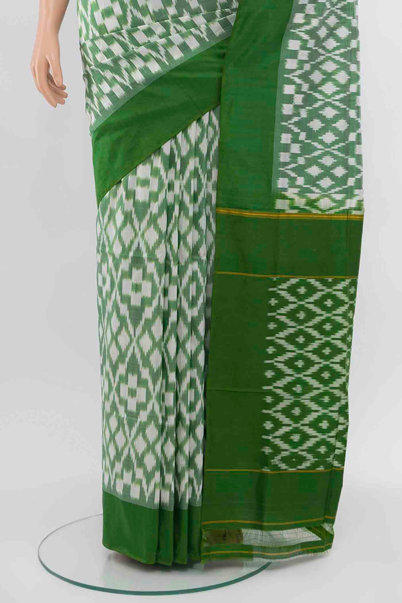 Pleats and pallu of Light Green Pochampally Silk Saree with Zari Butta on the body and Silk Border. 