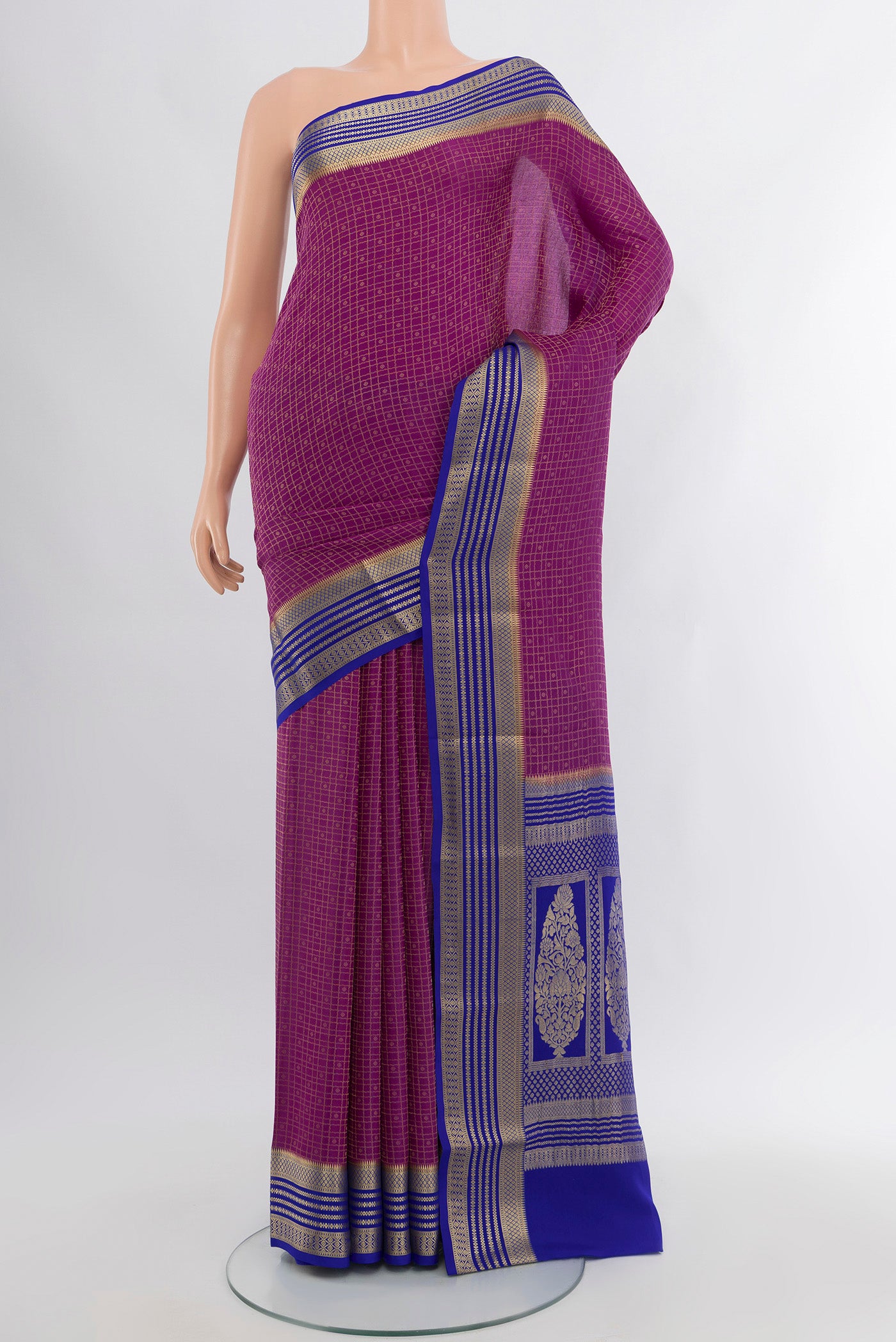 Purple Mysore Crepe Saree with Zari Butta on the body and Zari Border.  displayed on a mannequin