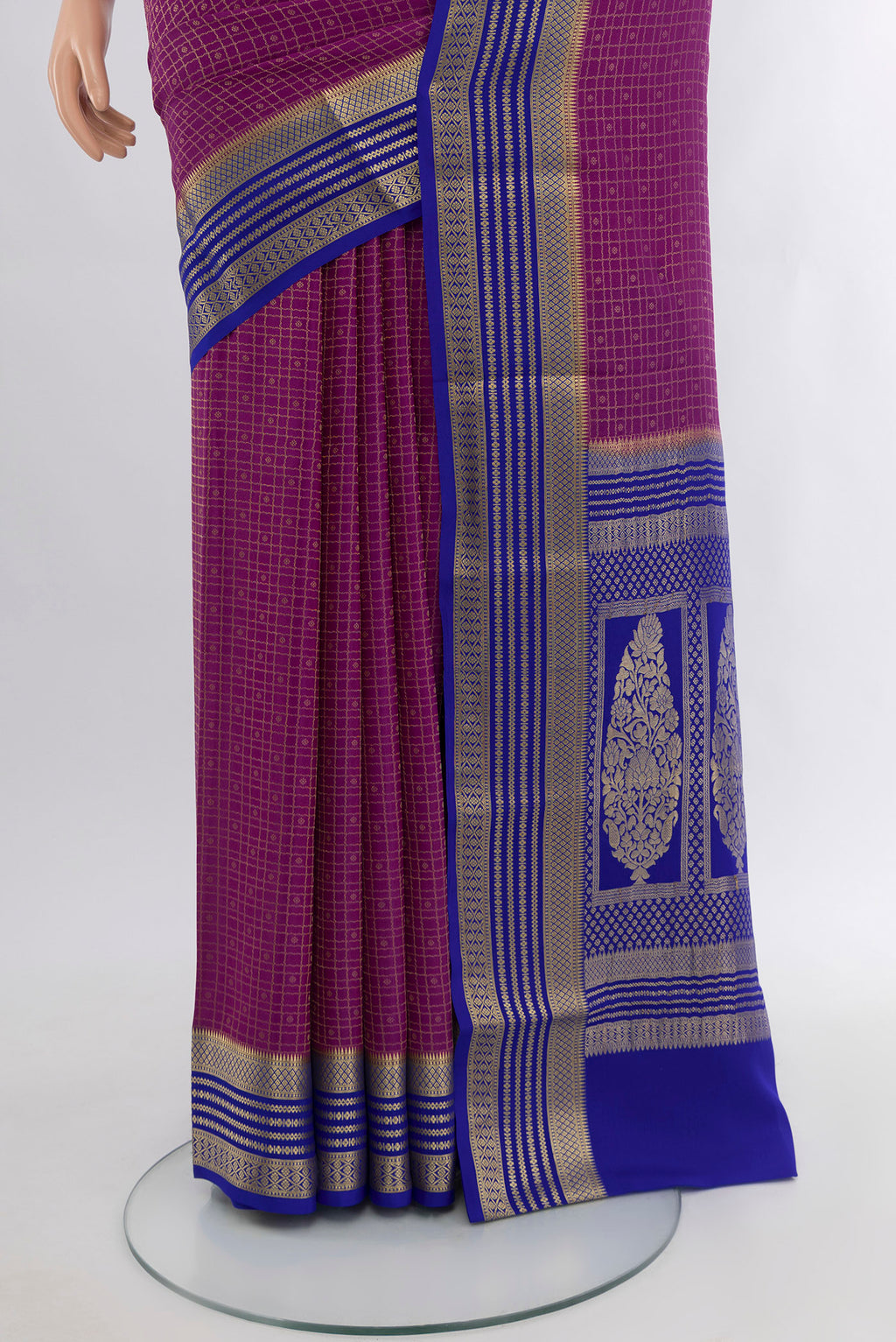 Pleats and pallu of Purple Mysore Crepe Saree with Zari Butta on the body and Zari Border. 
