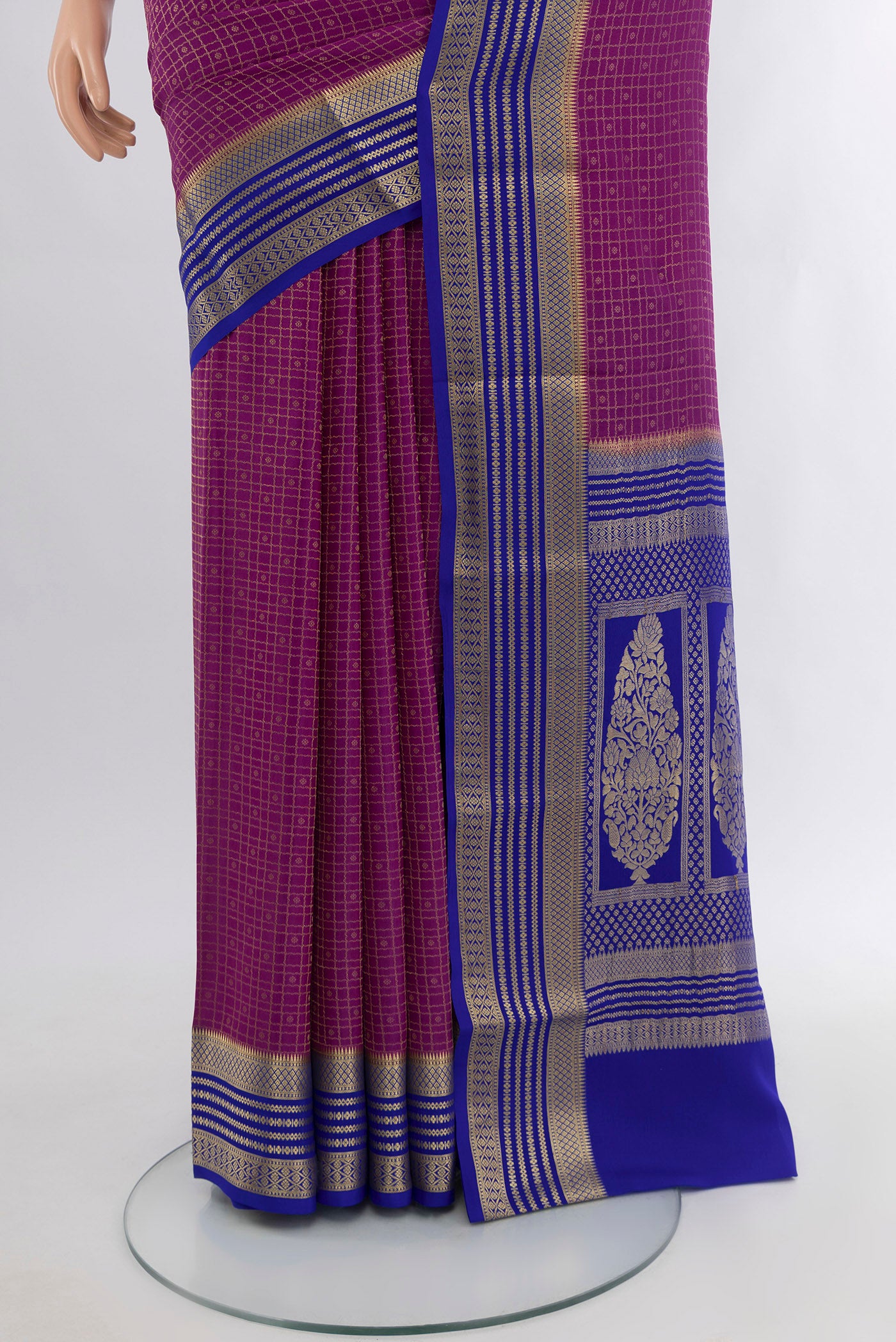 Pleats and pallu of Purple Mysore Crepe Saree with Zari Butta on the body and Zari Border. 