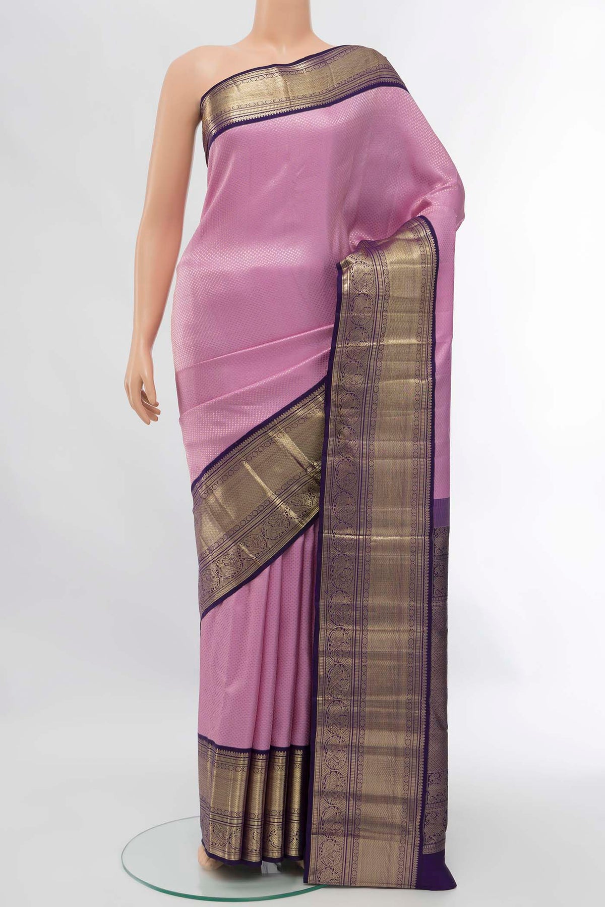 Lavender Kanchipuram Silk Saree with Zari Brocade on the body and Zari Border displayed on a mannequin