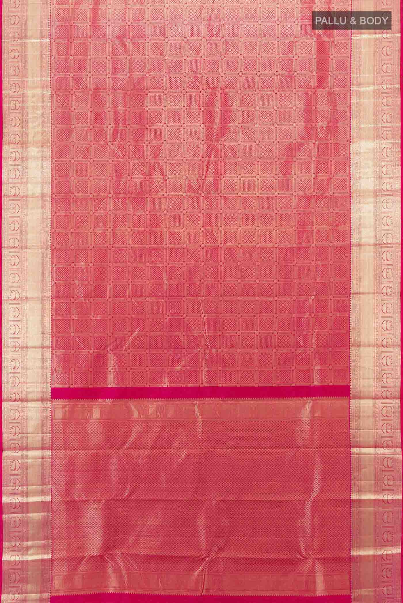 Flat view of Dark Pink Kanchipuram Silk Saree with Zari Butta on the body and Zari Border. 
