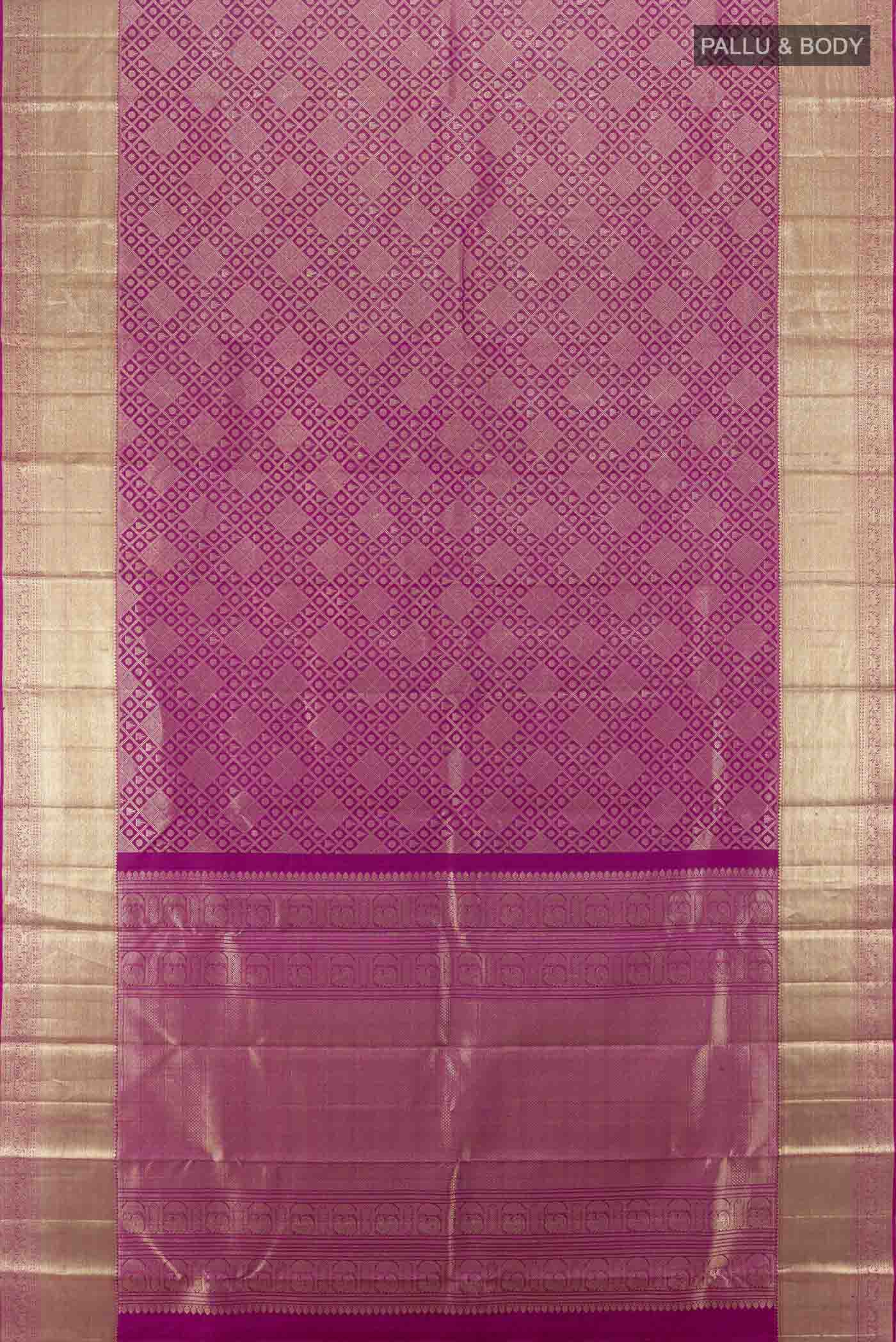 Flat view of Magenta Kanchipuram Silk Saree with Zari Butta on the body and Silk Border. 