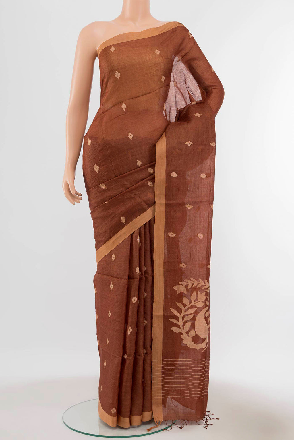 Brown Tussar Silk Saree with Thread Butta on the body and Thread Border displayed on a mannequin