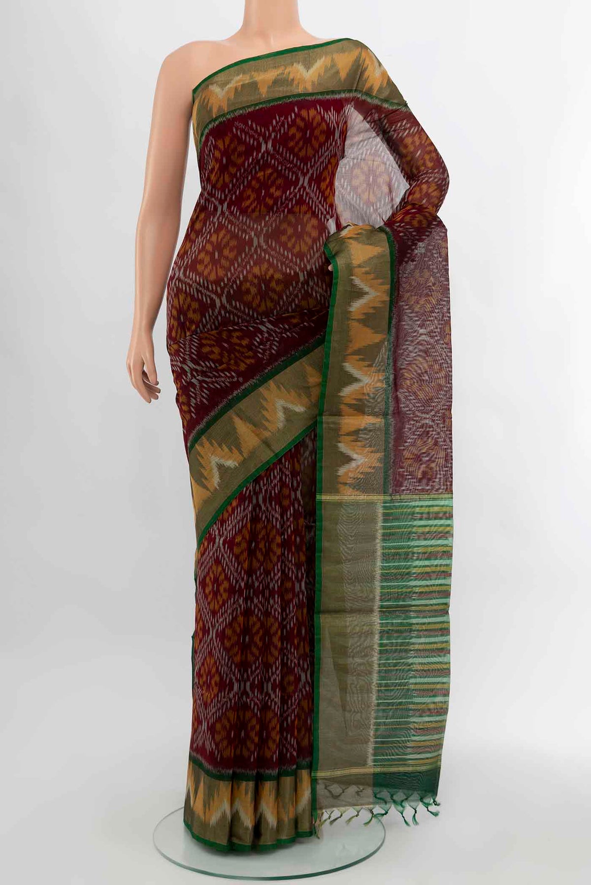 Maroon Kora Cotton Saree with Ikat Print on the body and Silk Border displayed on a mannequin