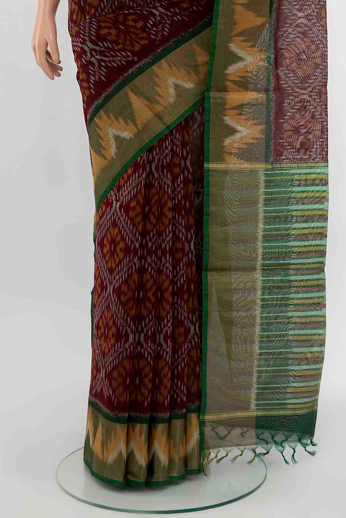 Pleats and pallu of Maroon Kora Cotton Saree with Ikat Print on the body and Silk Border