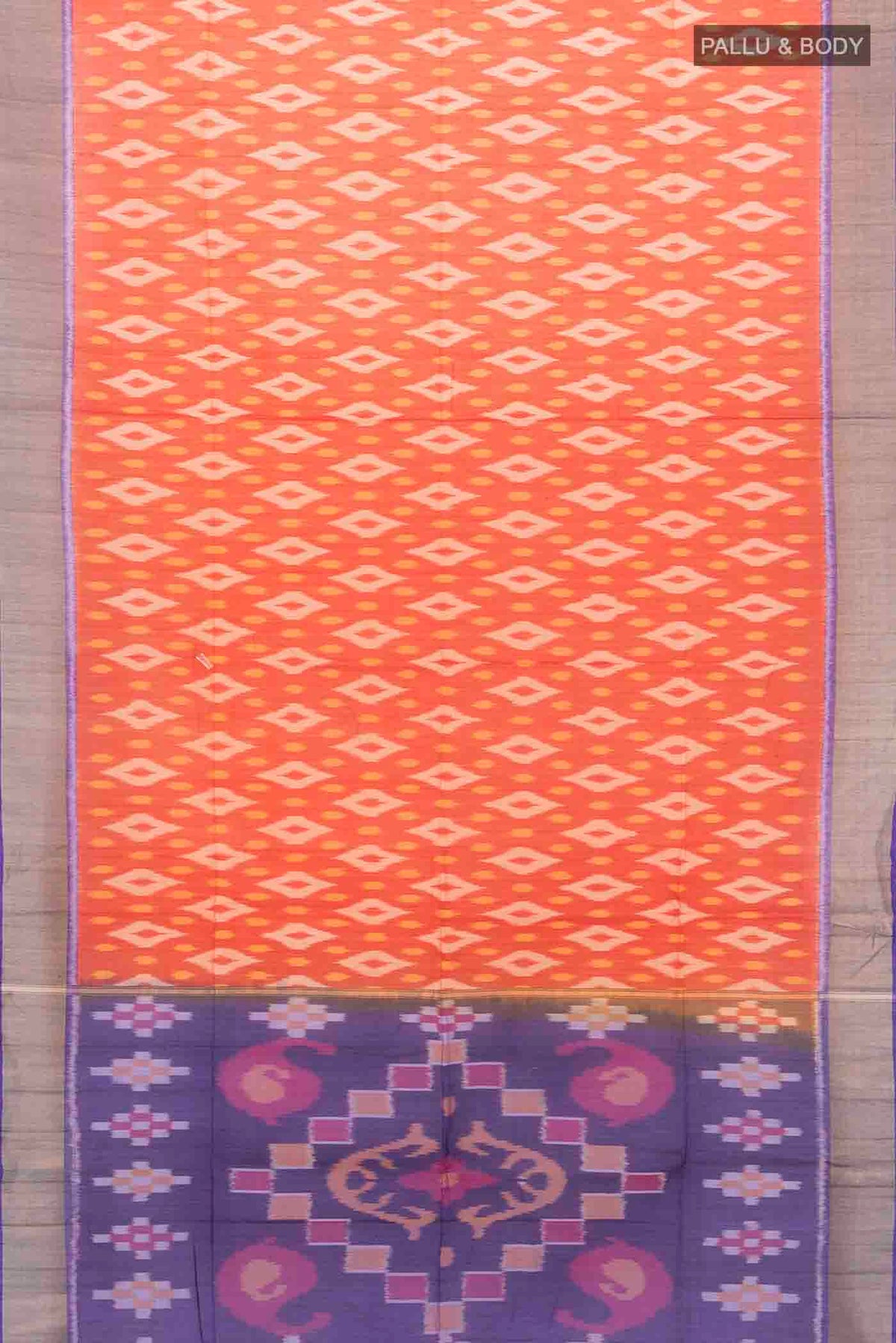 Flat view of Red Kora Cotton Saree with Ikat Print on the body and Fancy Border