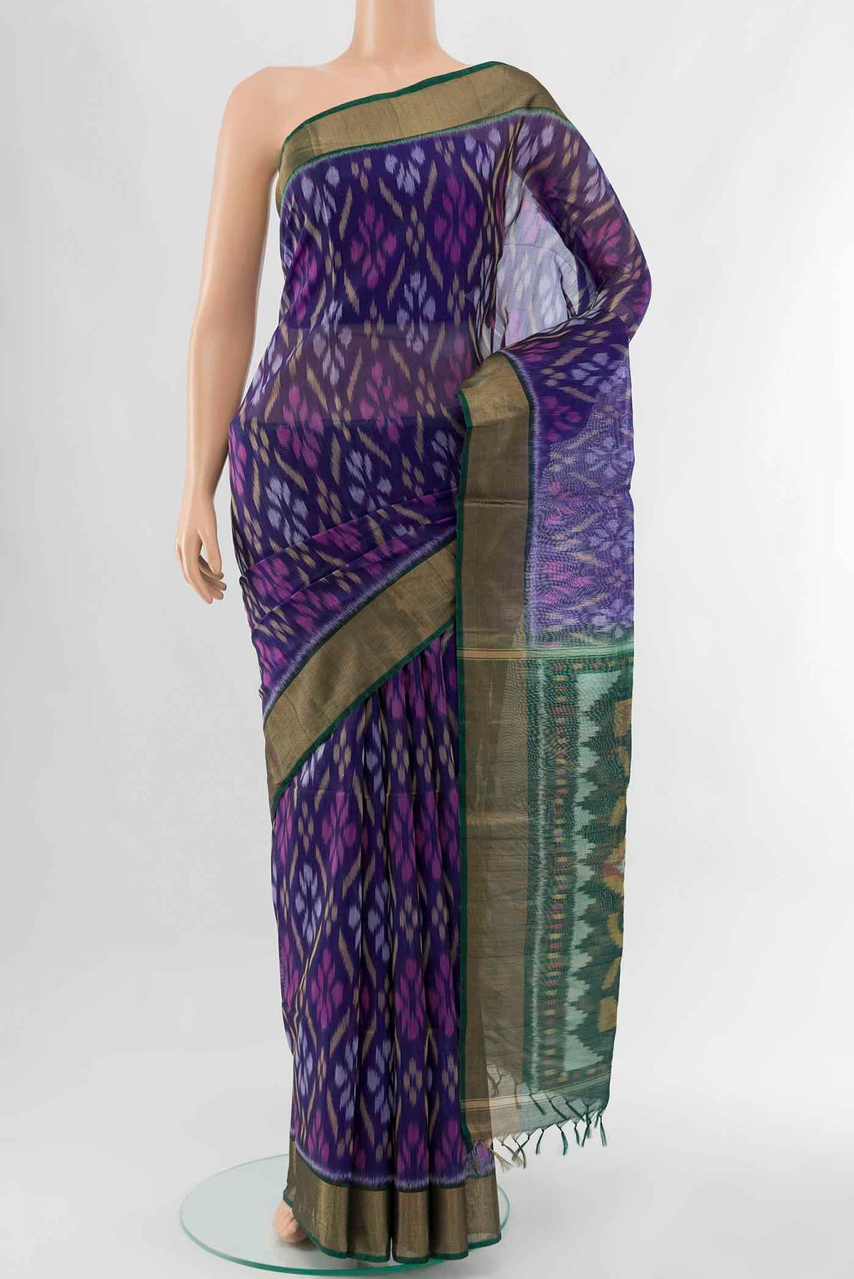 Blue Kora Cotton Saree with Ikat Print on the body and Fancy Border displayed on a mannequin