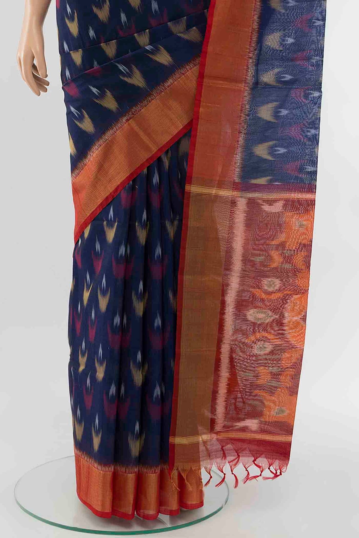 Pleats and pallu of Navy Blue Kora Cotton Saree with Ikat Print on the body and Fancy Border