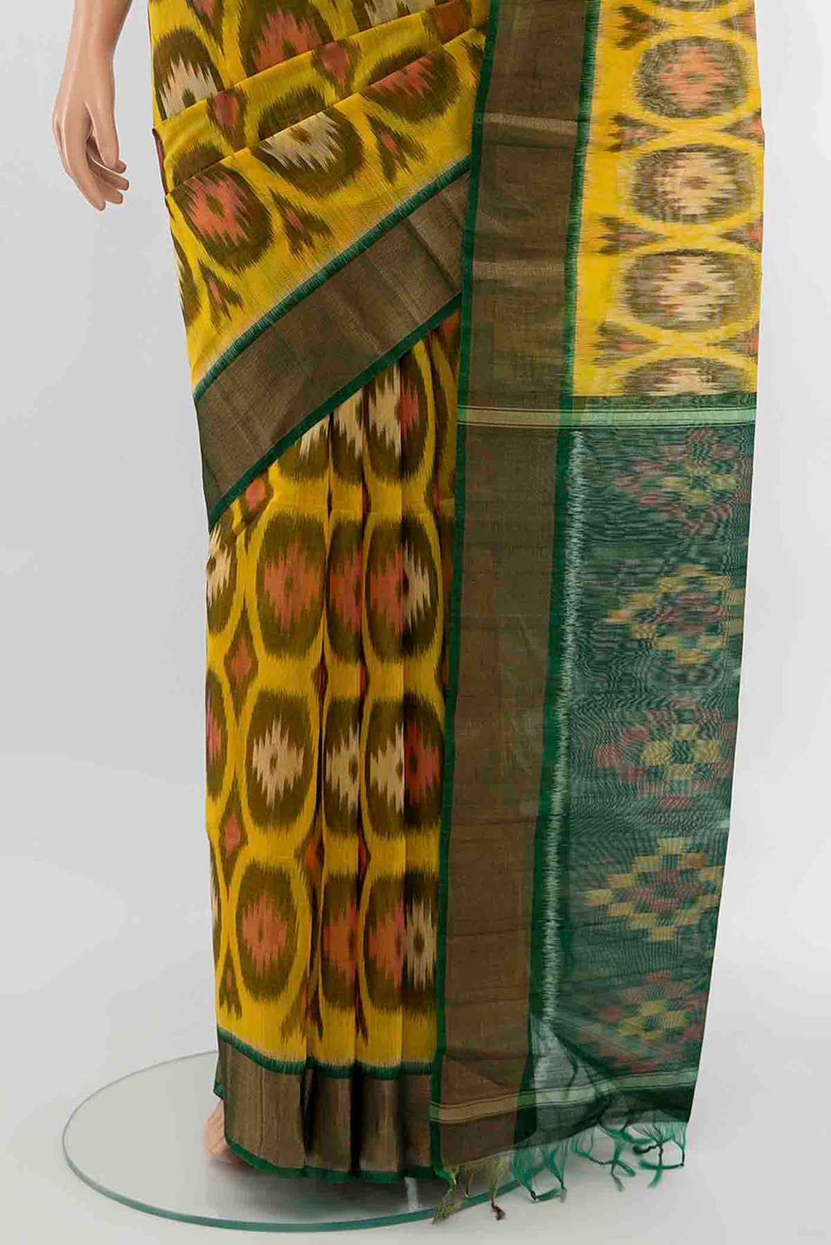 Pleats and pallu of Yellow Kora Cotton Saree with Ikat Print on the body and Silk Border
