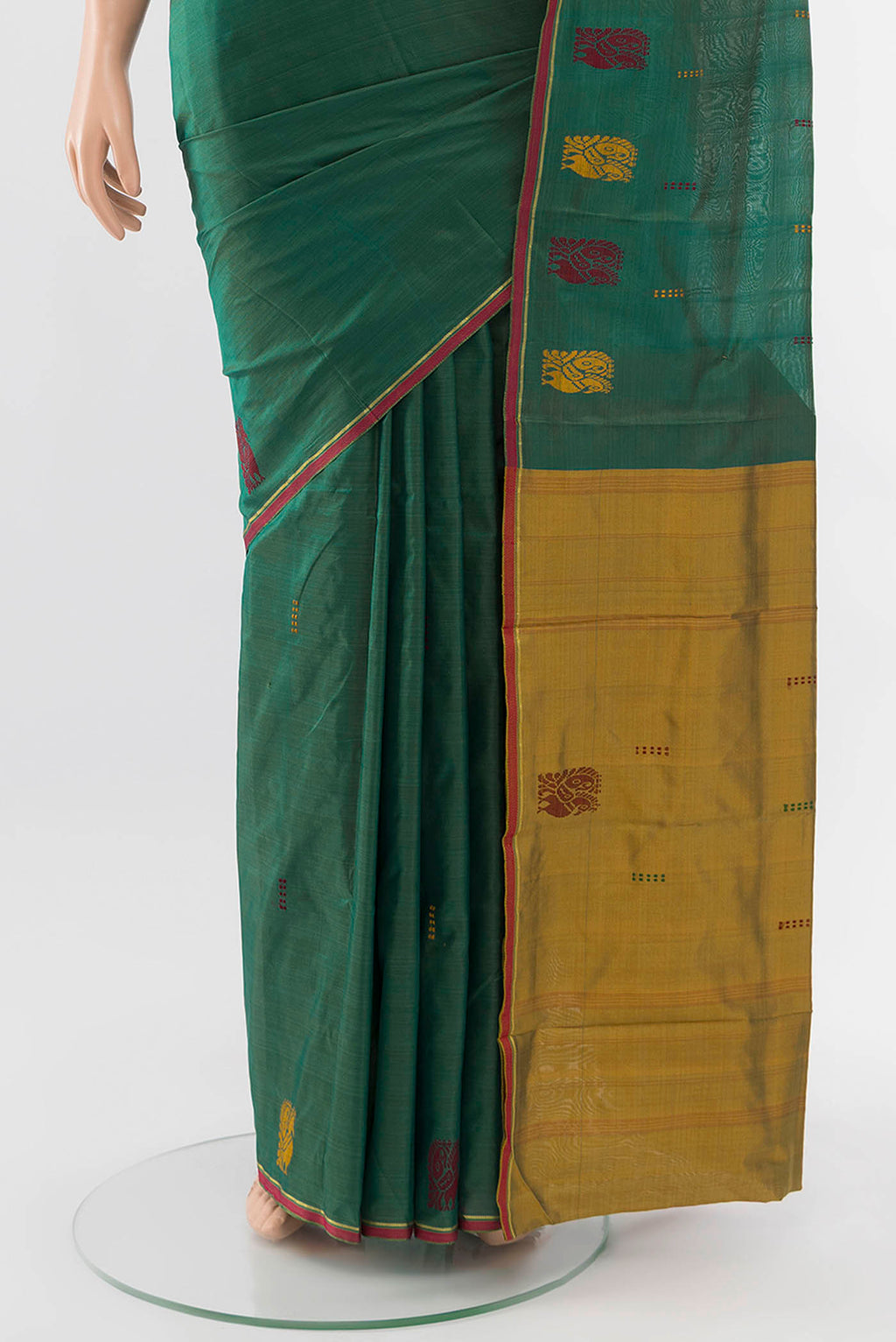 Pleats and pallu of Peacock Blue Kanchipuram Silk Saree with Zari Butta on the body and Silk Border