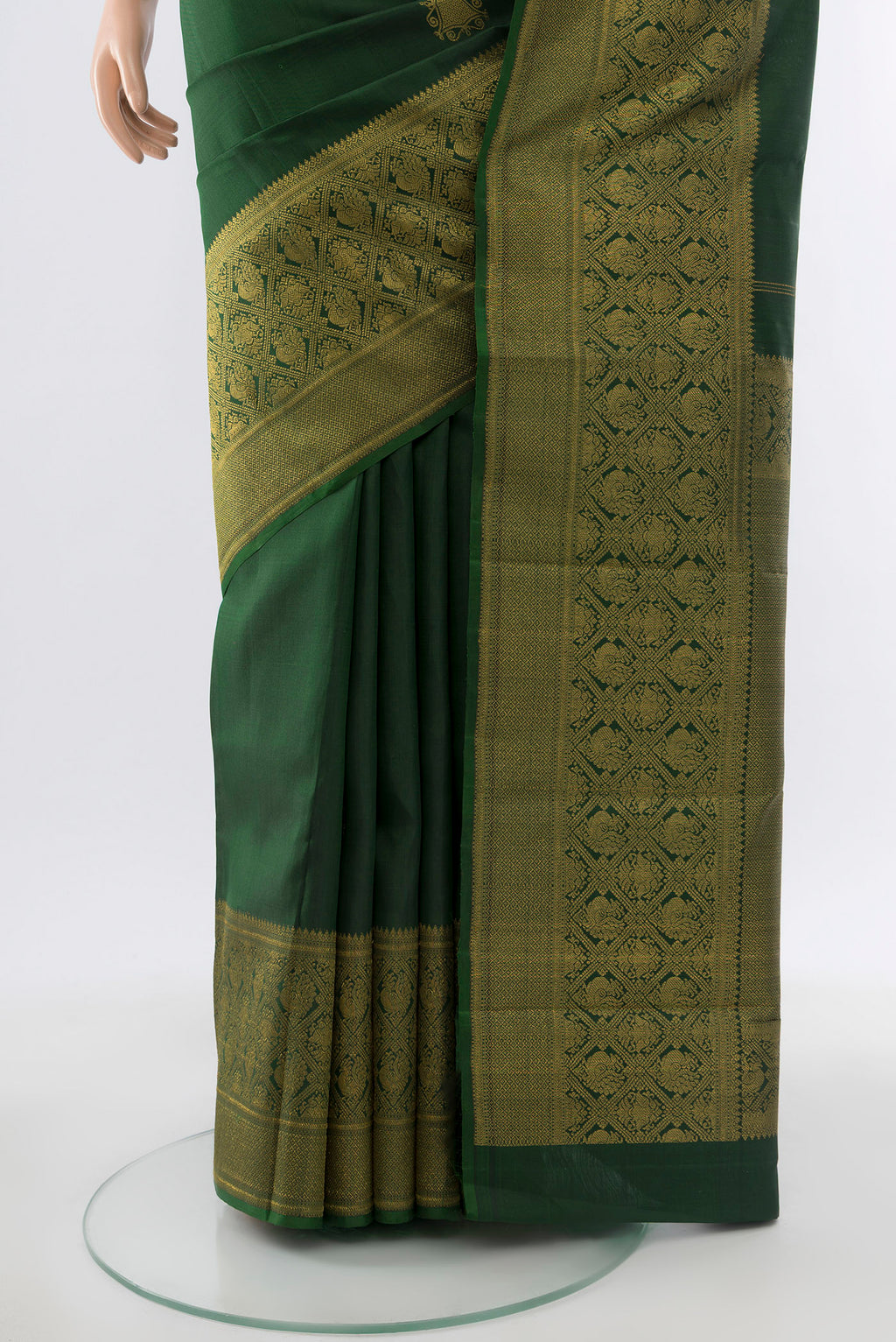 Pleats and pallu of Pure Silk Pure Zari Bottle Green Kanjivaram Saree with Zari Butta on the body and Silk Border. 